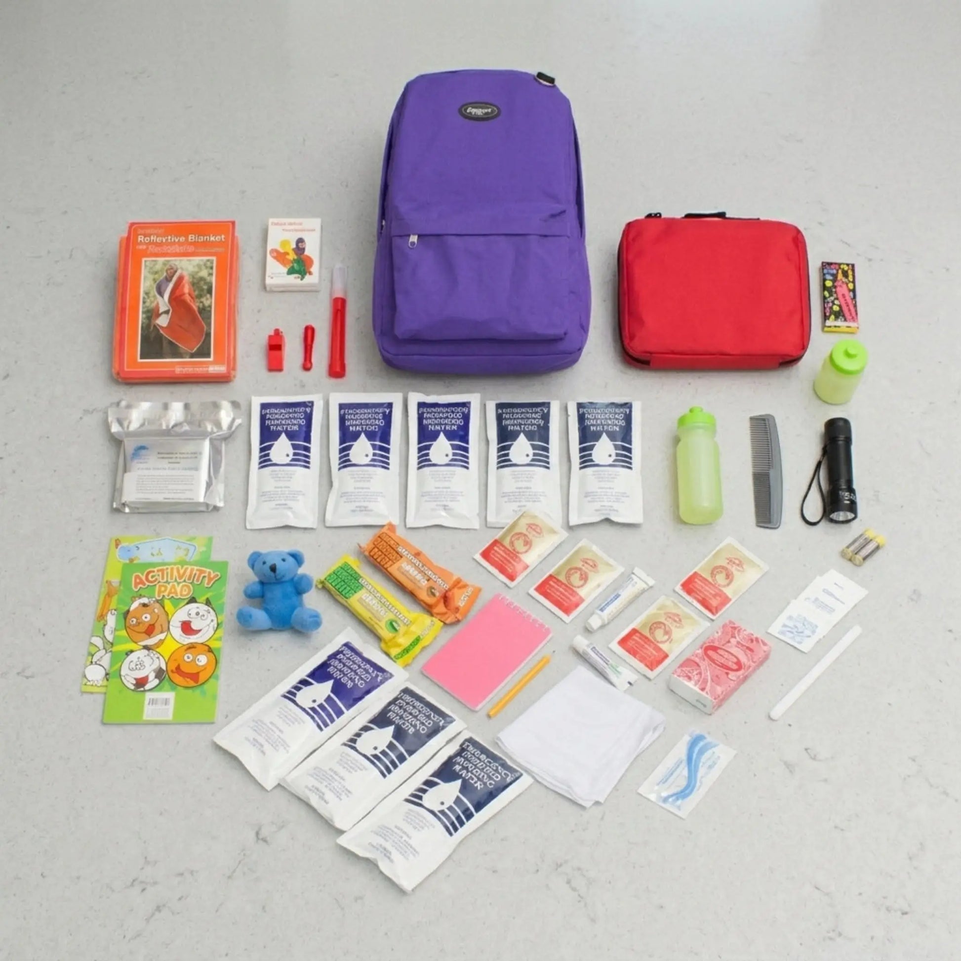 purple childrens emergency survival kit laid out with contents next to it for easy viewing