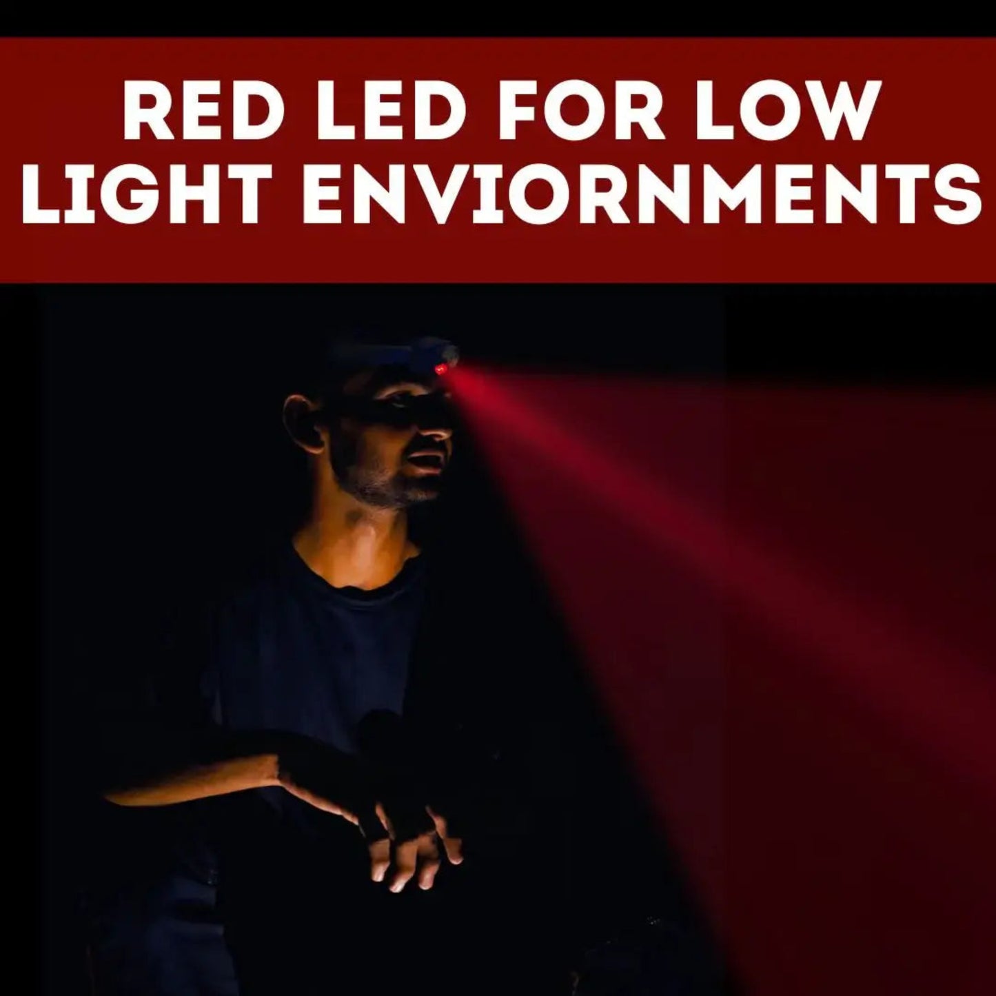 A man wearing a headlamp in a very dark environment, with a red light beam projecting to the right. A red banner at the top reads 'RED LED FOR LOW LIGHT ENVIRONMENTS' in white text.