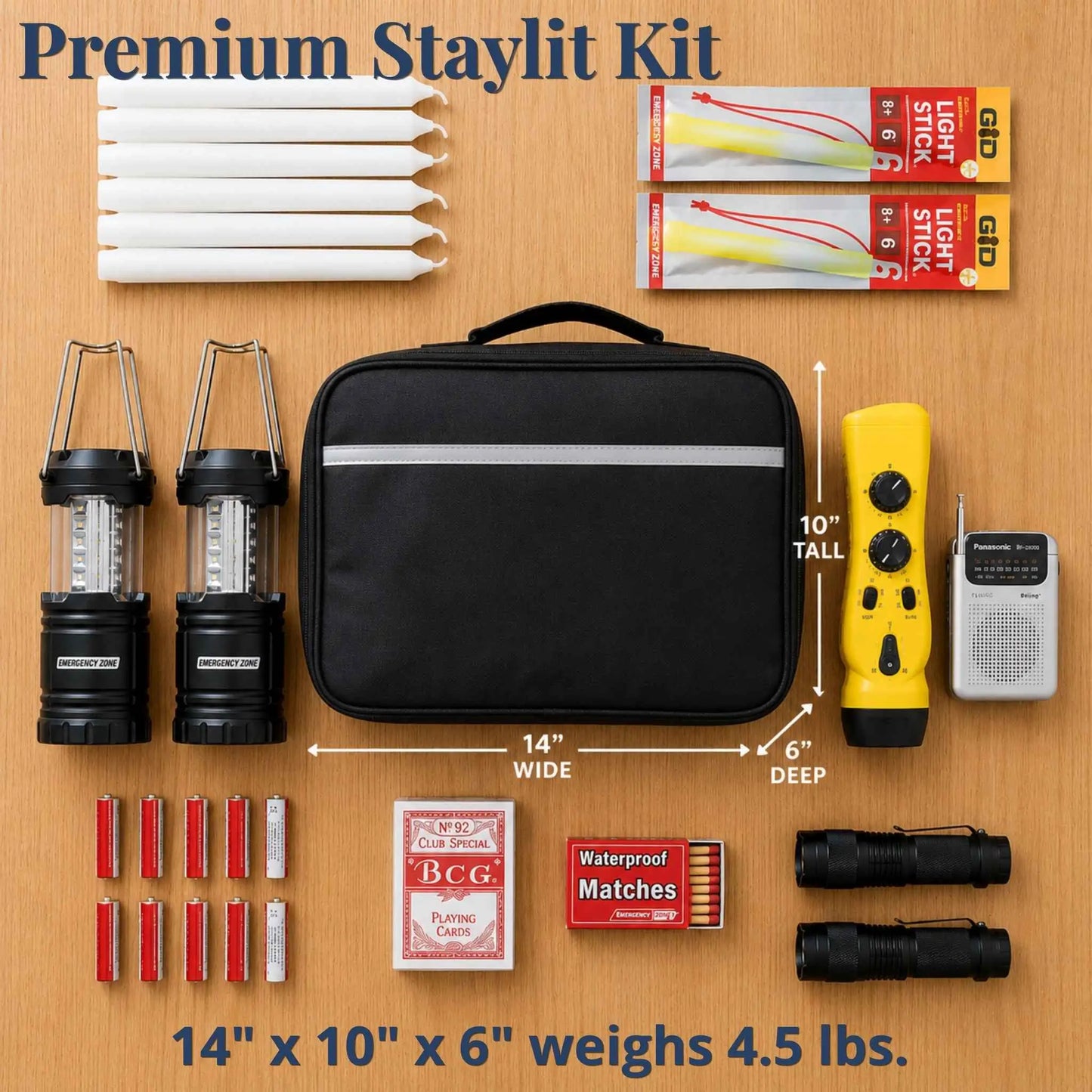Premium Staylit Kit laid out on a wood background, including a black zippered bag, two lanterns, white candles, two yellow LED light packs, a walkie-talkie, BCG waterproof matches, two black flashlights, and batteries. Text shows dimensions and weight.